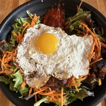 Seoul Taco signature dishes Gogi Bowl
Korean Cheesy Corn Elote Quesadilla
Kimchi Fried Rice
